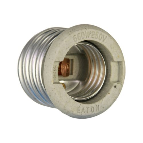 Eaton porcelain keyless socket reducer from mogul to medium base, wiring device by Cooper, showing the socket and reduction fitting