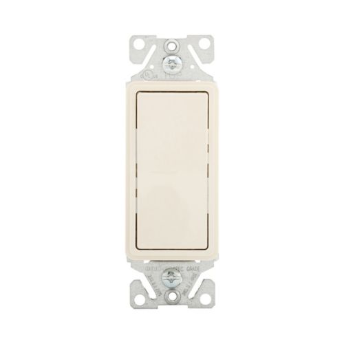 Eaton 15A standard decorator switch in light almond, mounted on wall, showing switch and wiring device for residential use.