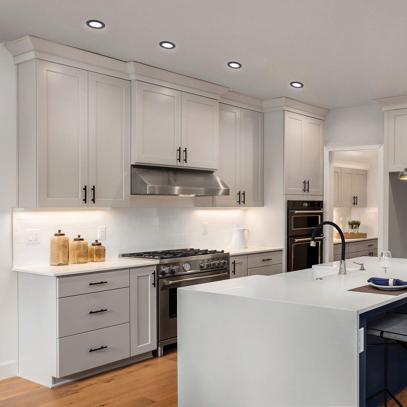 Black 12W Satco LED canless round downlight, 6-inch, CCT selectable, ideal for modern ceiling lighting.