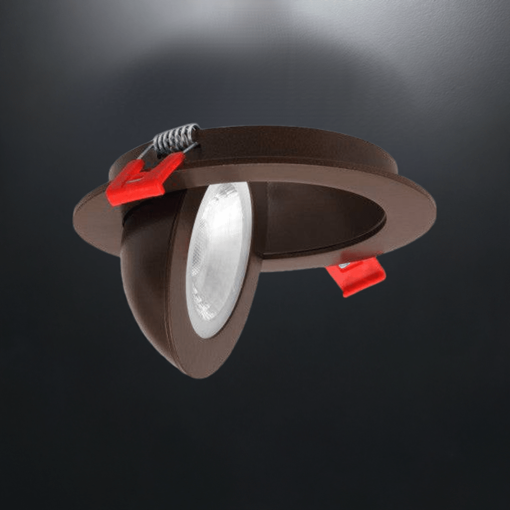 Nicor 4-inch oil-rubbed bronze LED recessed downlight with floating gimbal, adjustable color temperature 2700K-5000K, canless design.