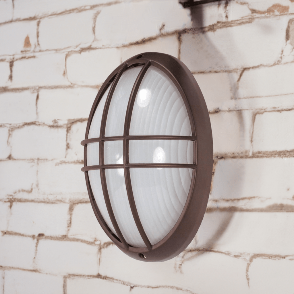 SATCO 13-inch large oval cage bulkhead exterior lighting fixture in architectural bronze finish, with protective cage and durable design