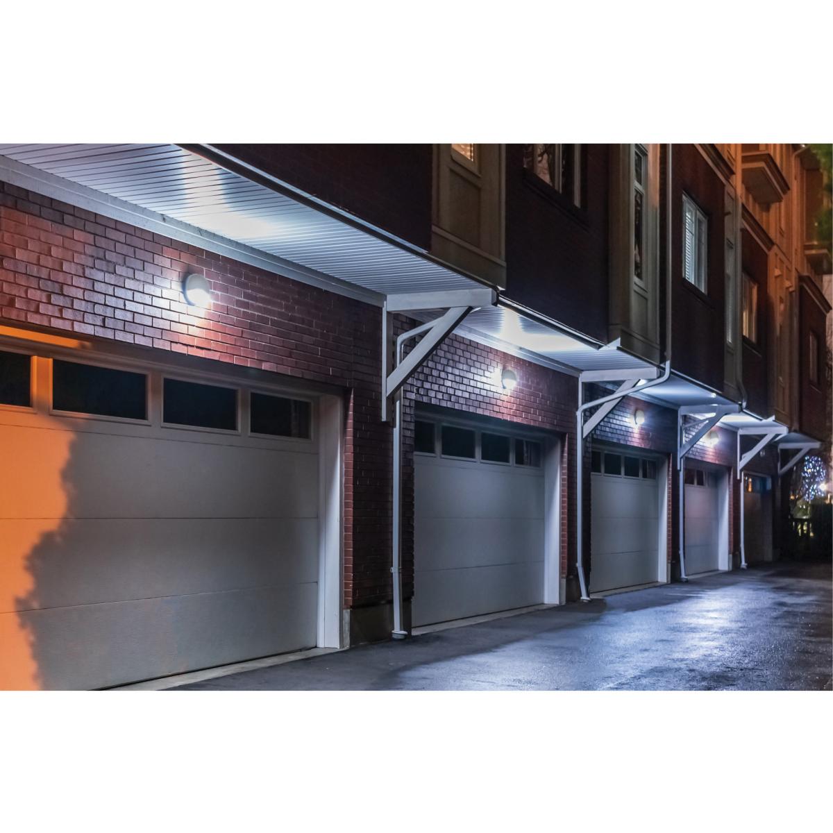 White LED small round wall pack exterior lighting fixture with 20W, CCT selectable, bypassable photocell by Satco
