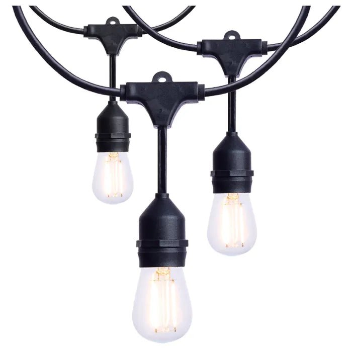 Satco 24-foot LED string light with 12 S14 lamps, 2700K warm white, black cord, for indoor or outdoor decorative lighting.