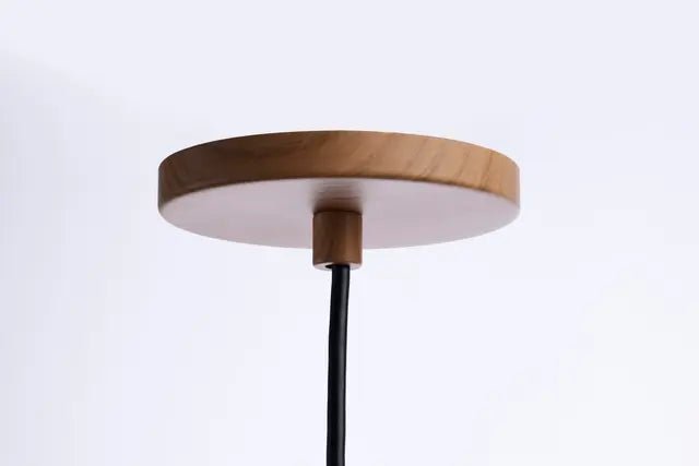 Satco 6-inch LED pendant light in ash wood finish, 12W, 3000K warm white LED lighting fixture with sleek design.
