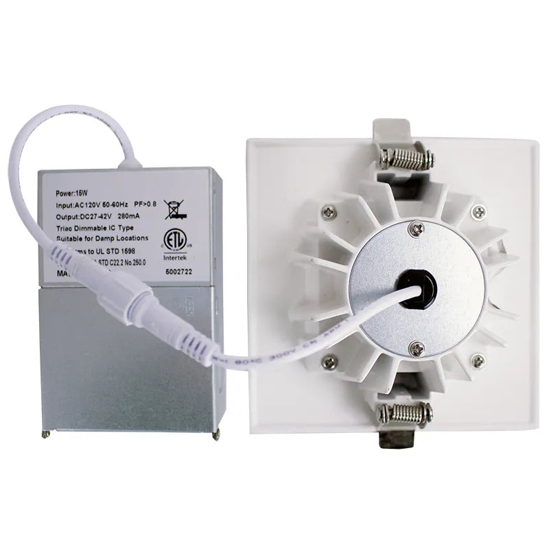 White 4-inch Westgate LED wafer canless light, 15W, available in 2700K to 5000K color temperatures, for modern ceiling lighting.