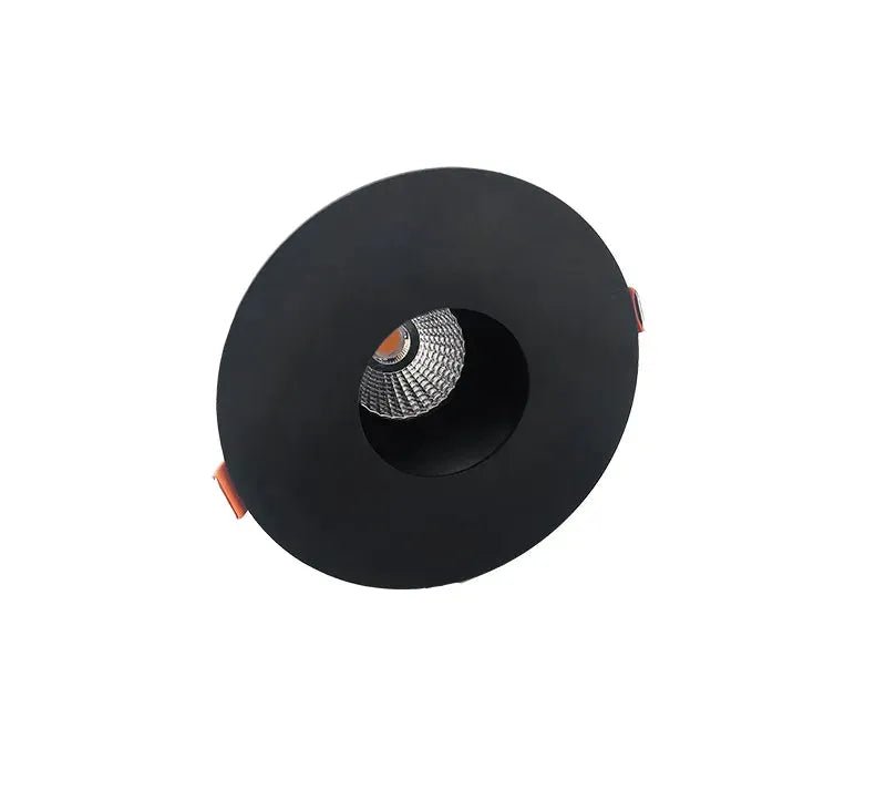 Black Westgate LED wafer 4-inch architectural canless recessed light with pin hole design, ideal for modern indoor lighting.
