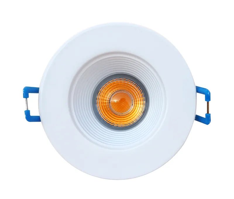 Westgate round LED wafer recessed light, 2-inch, white, 9W with adjustable color temperatures 27K-50K, for modern ceiling lighting.