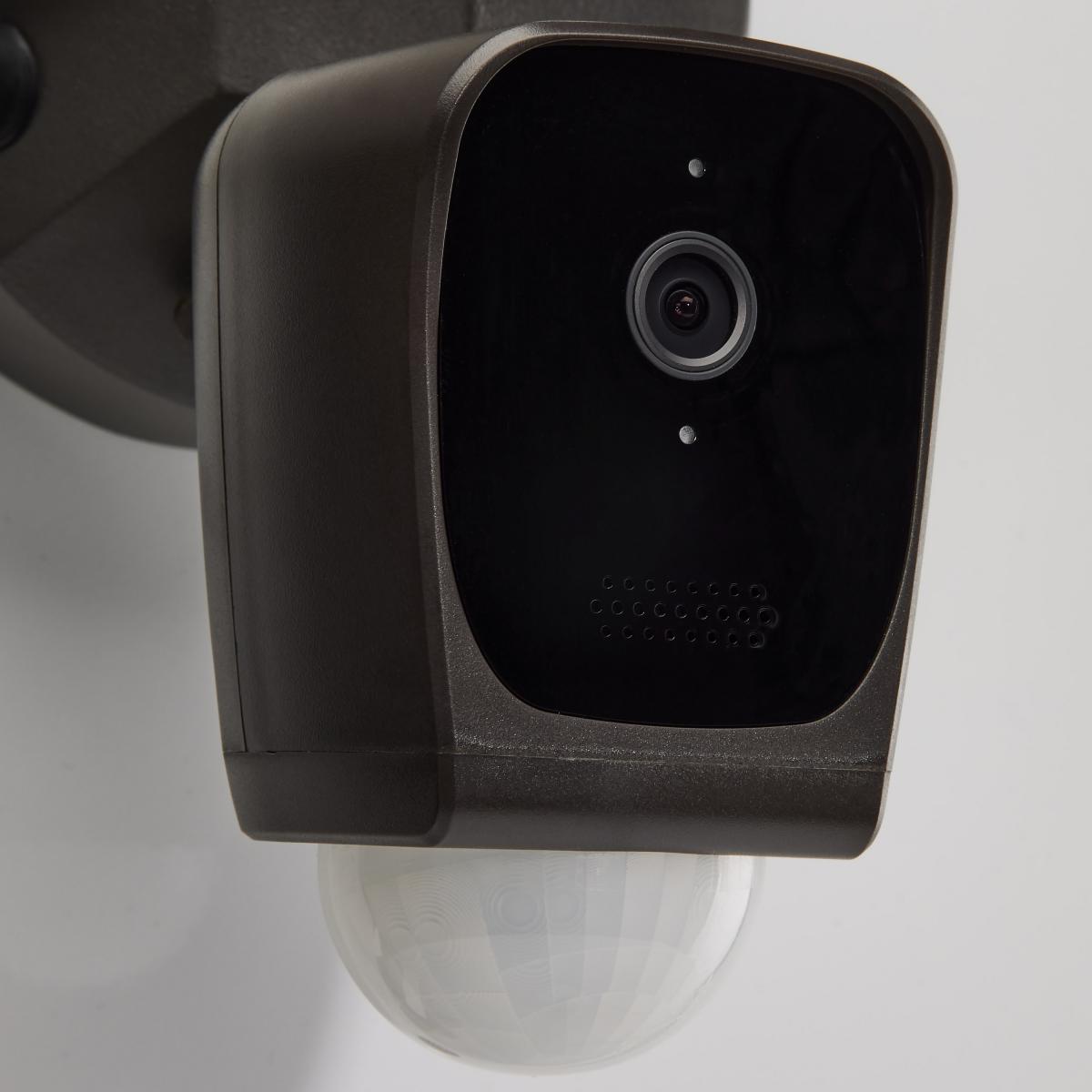 Satco Bullet Outdoor SMART Security Camera with Starfish enabled, brown finish, mounted on exterior lighting fixture for home security.
