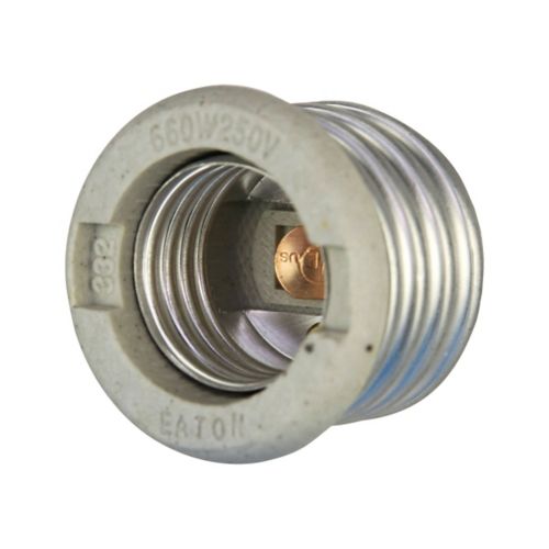 Cooper Eaton porcelain keyless socket reducer from mogul to medium base for wiring device applications.