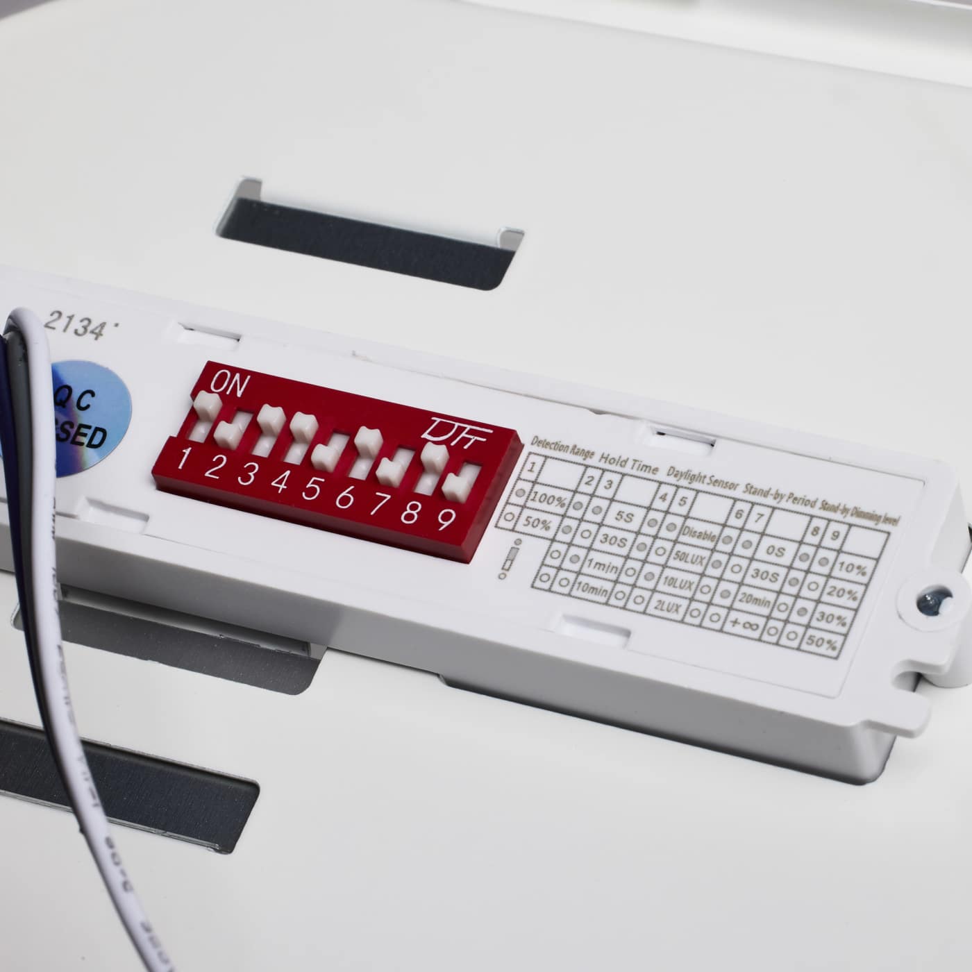 Satco 20W LED vapor-proof lighting fixture with emergency battery, CCT selectable, suitable for 120-347V environments.