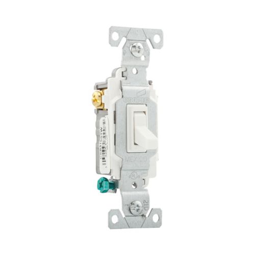 White Eaton three-way 15A commercial toggle switch by Cooper, showing the switch with wiring connections and mounting hardware.