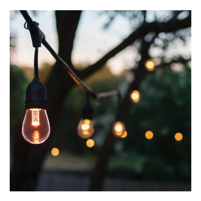 Satco RGB LED 48-foot string light with 15 S14 lamps, infrared remote, ideal for colorful outdoor or indoor lighting.