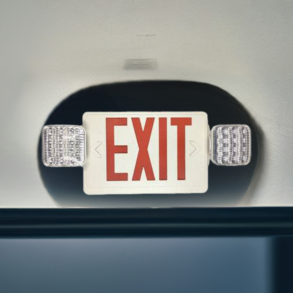 Red exit sign with emergency light, white housing, from Eiko, designed for indoor safety and emergency egress.