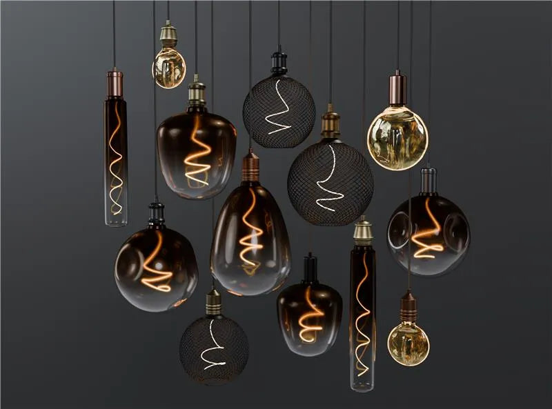 Westgate 2.4x10 inch amber decorative lamp with spiral filament, 1800K long form bulb, E26 base, vintage-style lighting.