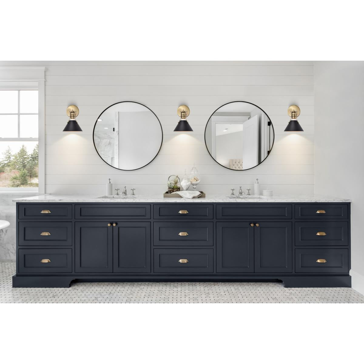 Satco Outpost 1-light wall sconce with matte black finish and burnished brass accents, LED lighting fixture for modern decor.