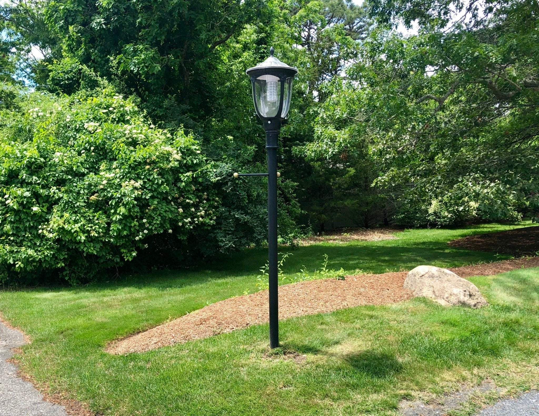 Light Efficient Design 20W solar LED post top light with 4000K warm white glow, outdoor solar-powered LED lighting fixture